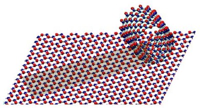 Structural models of a BN monoatomic sheet and a single-shelled BN nanotube. Alternating B and N atoms are shown in blue and red.