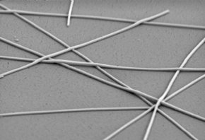 Cambrios silver nanowire touch sensors consist of a loose network of overlaying nanowires, creating a conductive mesh with enough empty space to make the layer transparent.