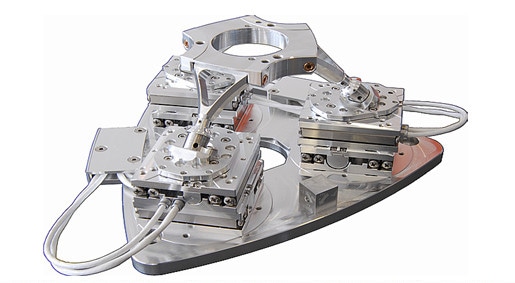 UHV-compatible low-profile planar-pod 6-axis positioning systems. (Image: PI miCos)