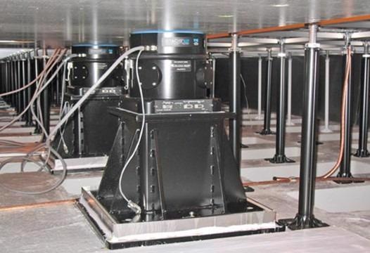 TMC Quiet Island vibration cancellation system with STACIS III isolators on risers under are raised floor.