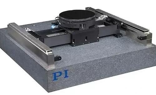 An ultra-high performance, granite based XY-Theta stage assembly based on an A-322 planar air bearing XY stage with an air bearing rotary table