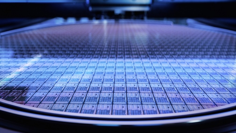 Macro Shot of a Silicon Wafer during Semiconductor and Computer Chip Manufacturing at Fab or Foundry.