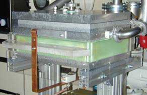 Parallel plate plasma treatment chamber to functionalize bucky papers and the treatment of aligned grown structures with a size of 40x30 cm2 (DIN A3).